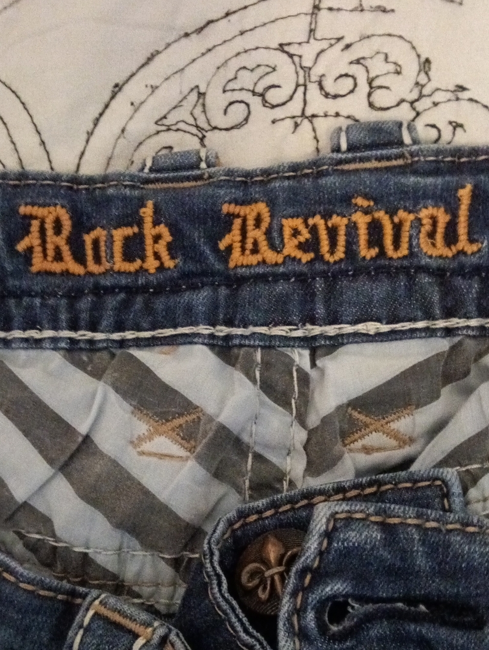 Rock Revival Dark Blue Jeans with Stylish Contrast Stitching
